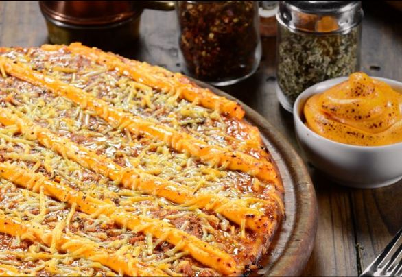 Com flocos de manteiga e até farinha integral; conheça o segredo das pizzarias do Clube